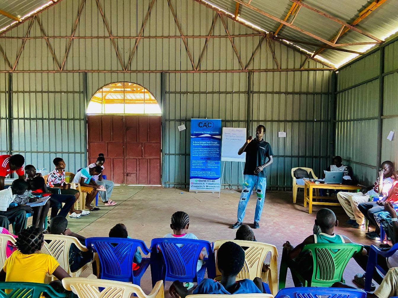 A young person presenting to a group