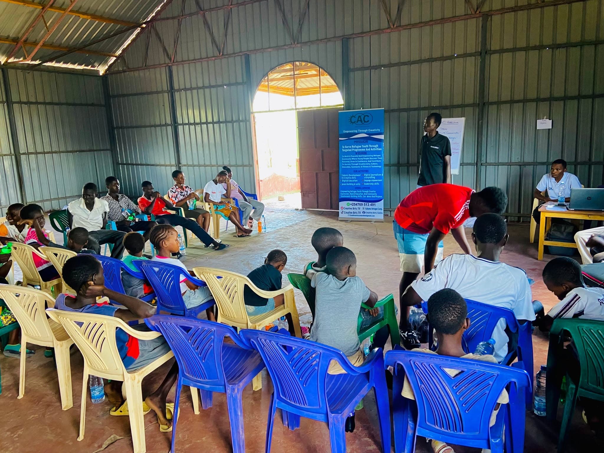 A young learner speaking in a group session