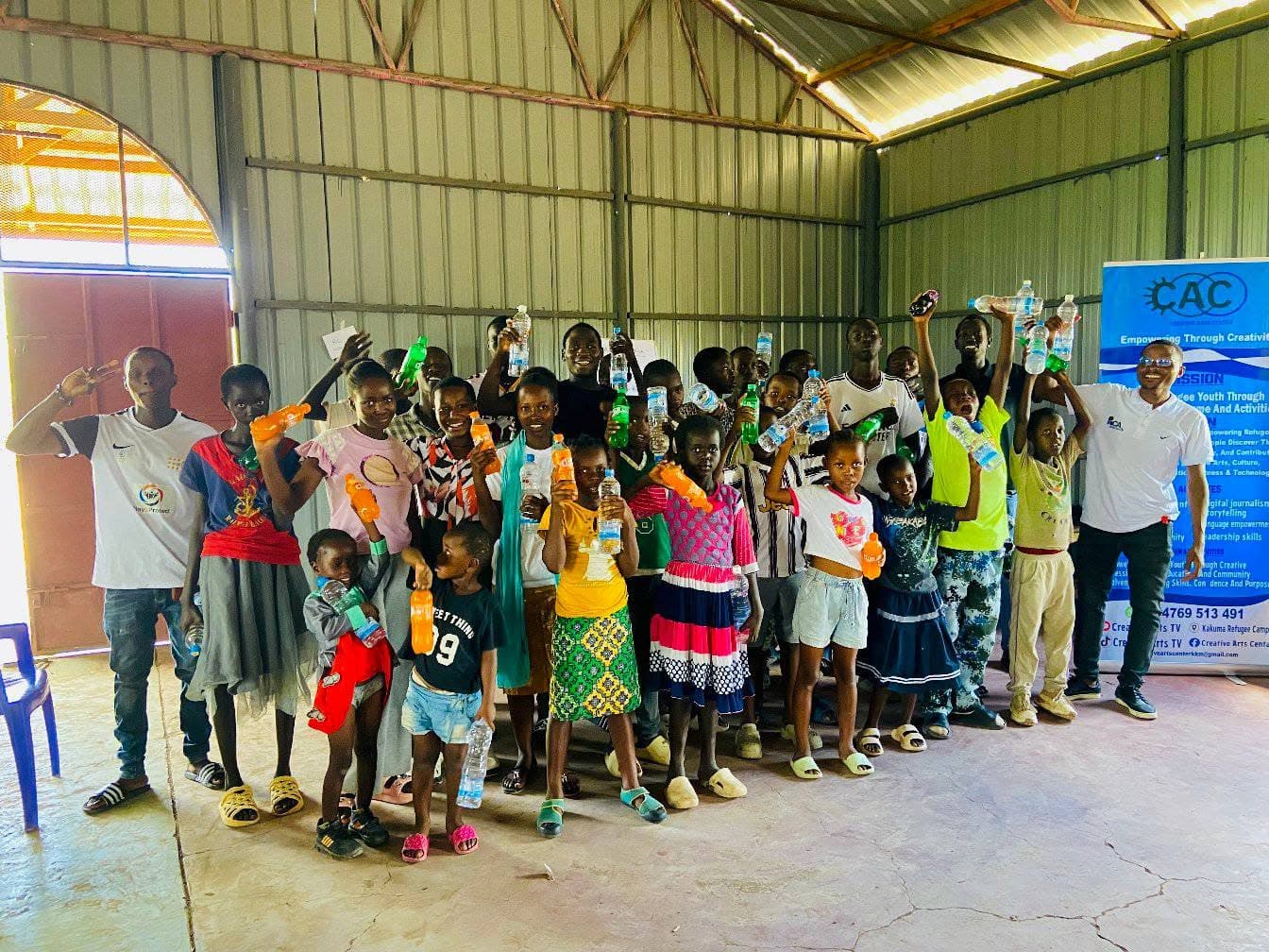 Young people from different communities laughing together